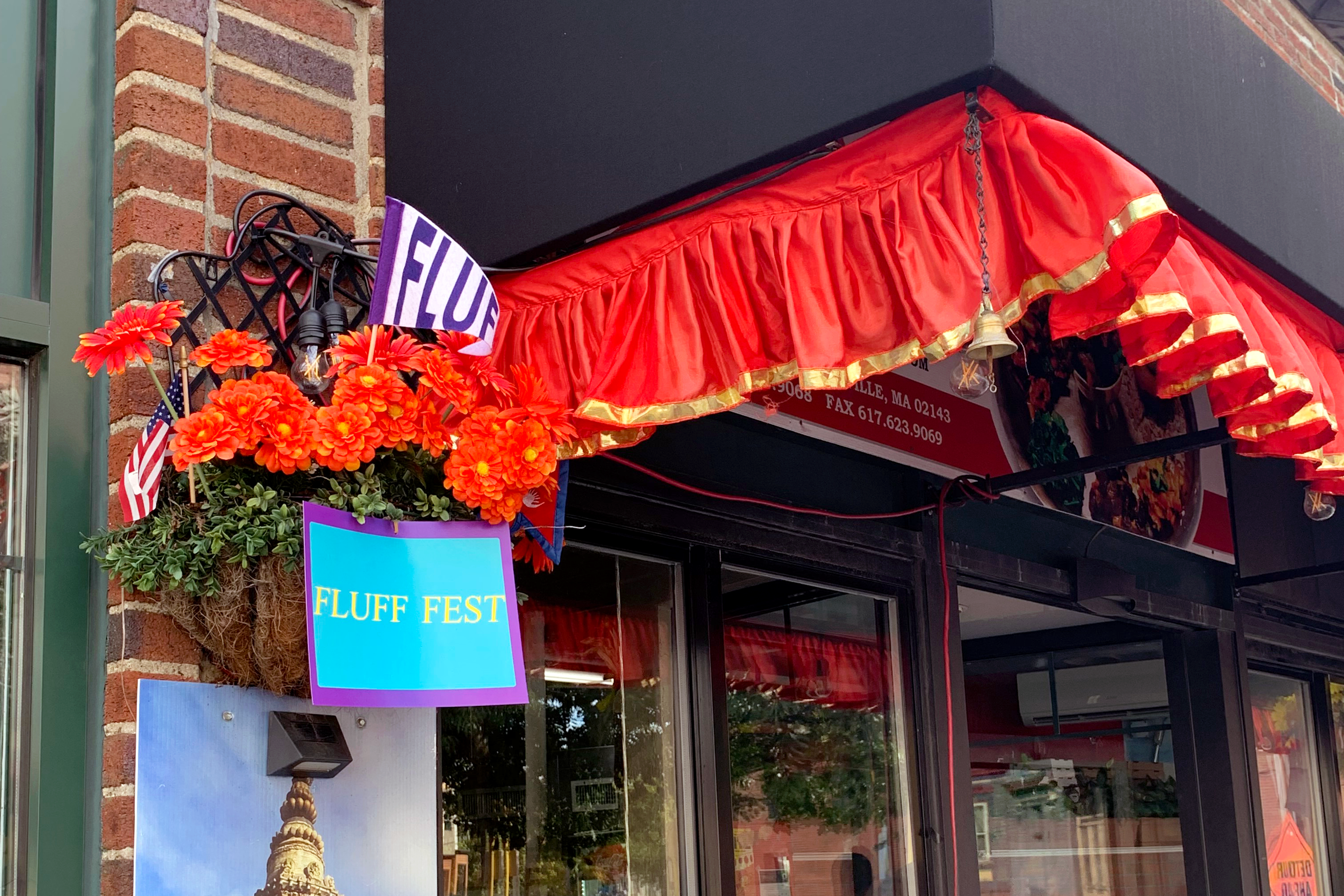 Fluff pennant displayed at a storefront