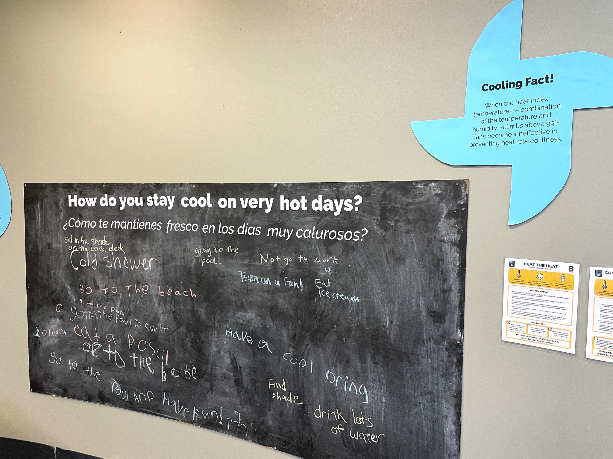 Chalkboard reading "How do you stay cool on very hot days?" and a cooling fact.