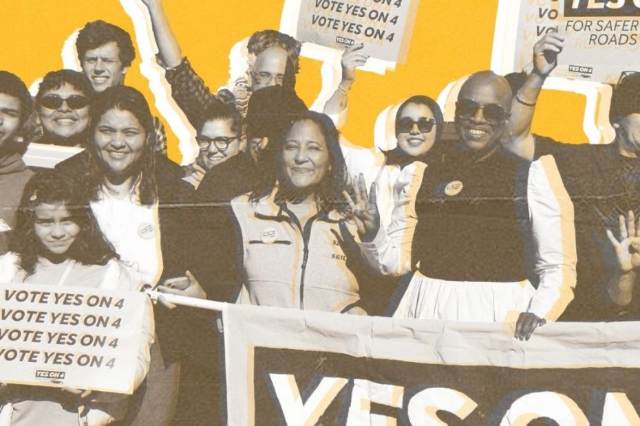 Group of people of all ages holding signs saying Vote Yes on 4 against a yellow background