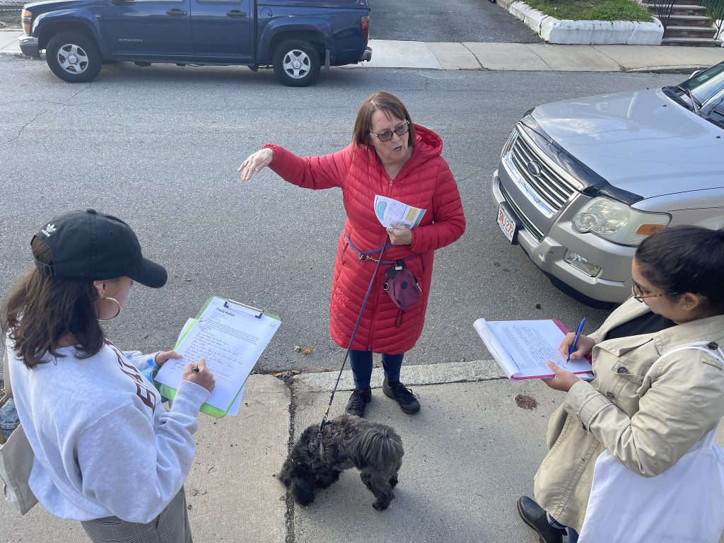 ALT: CultureHouse staff talking to a resident.