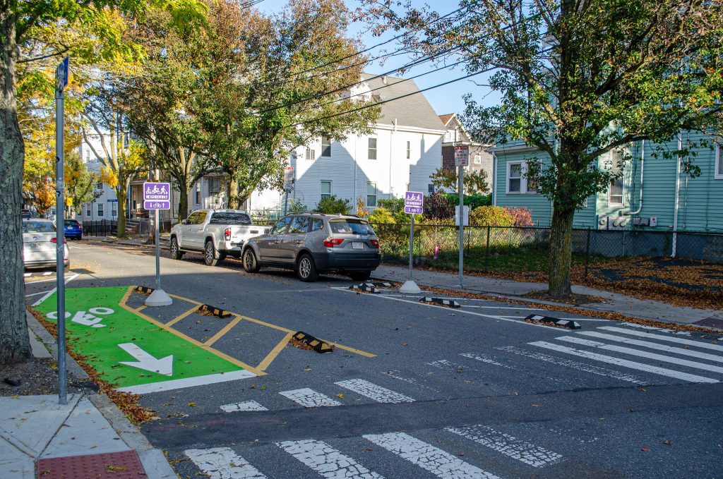 A street with a narrowed entrance and a contraflow bike exit.