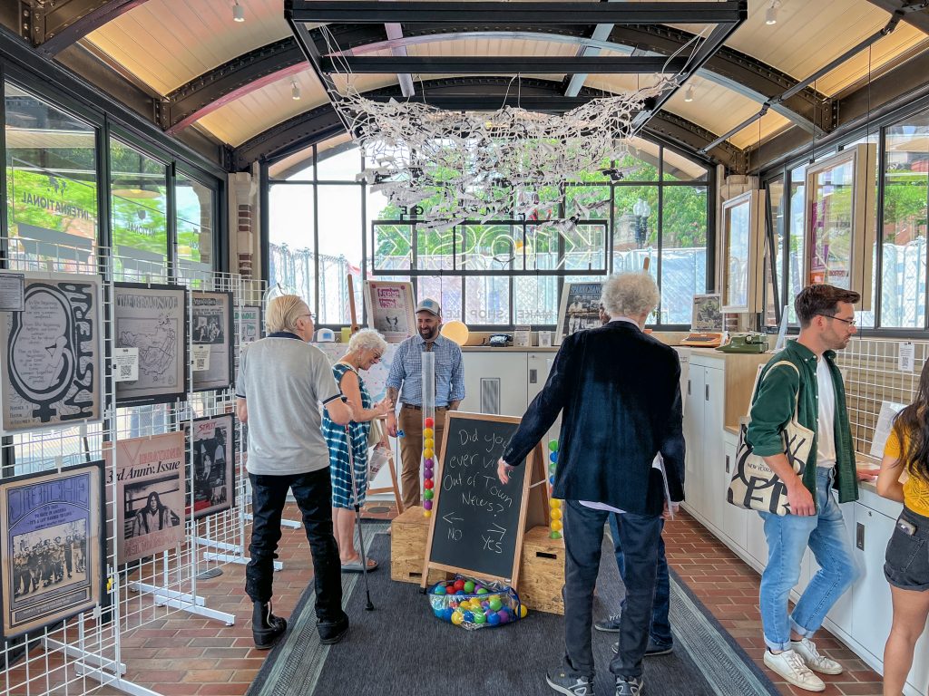 People gathered at the KiOSK