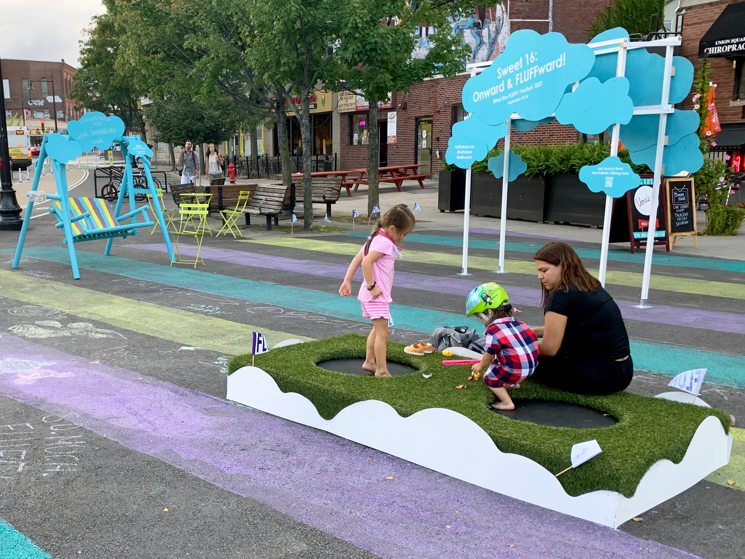 Kids playing on trampoline at Fluff Fest